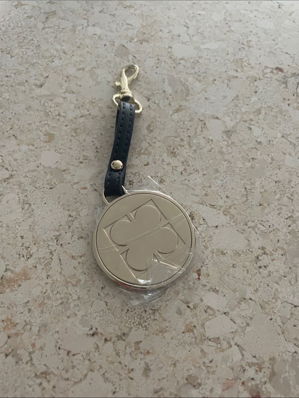 Gold-tone Clover Keychain with Black Leather Strap